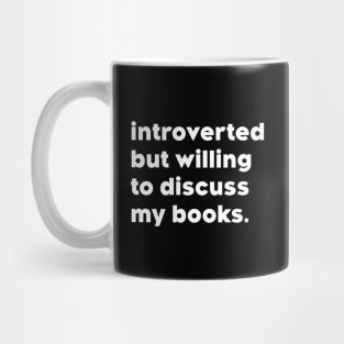 introverted but willing to discuss my books Mug
